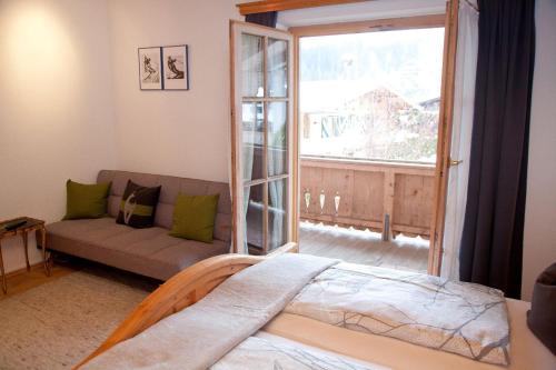 Postel nebo postele na pokoji v ubytování Egger Studio Hornblick