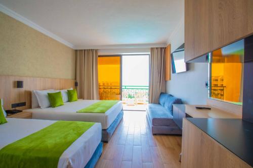 Cama o camas de una habitación en Hotel Argana Agadir
