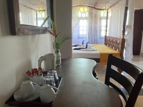Ein Sitzbereich in der Unterkunft Flamingo Guest house