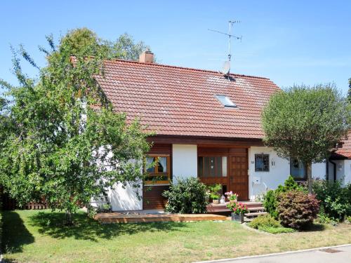 a small house with a red roof at Apartment Land in Sicht by Interhome in Rulfingen