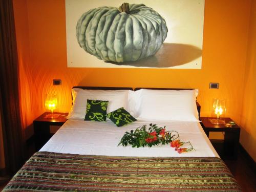 Postel nebo postele na pokoji v ubytování Agriturismo Corte Carnevale