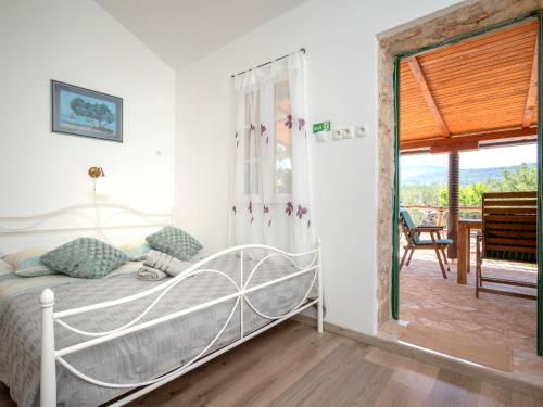 Giường trong phòng chung tại Holiday Home Marijo by Interhome