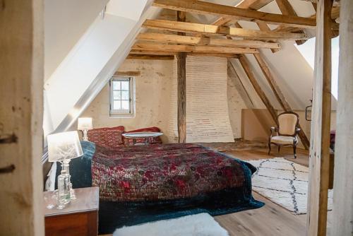 Ліжко або ліжка в номері La Cour du Liège-Charming renovated country estate
