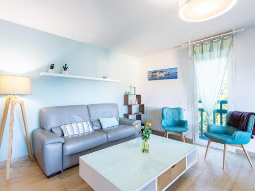 a living room with a couch and two chairs at Apartment IBIRY by Interhome in Ciboure