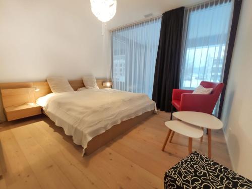 Säng eller sängar i ett rum på Apartment Seewiesenstrasse by Interhome