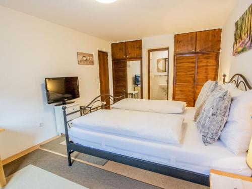 Ένα ή περισσότερα κρεβάτια σε δωμάτιο στο Studio Garten Appartement by Interhome