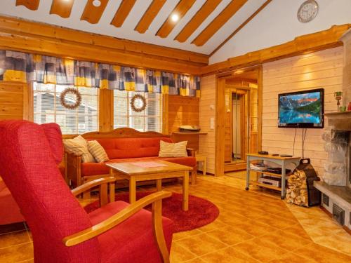 TV a/nebo společenská místnost v ubytování Holiday Home Lauri 5 by Interhome