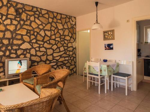 TV a/nebo společenská místnost v ubytování Holiday Home Dada by Interhome