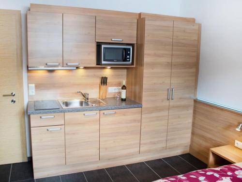 Kuchyňa alebo kuchynka v ubytovaní Apartment Bella Monte-3 by Interhome