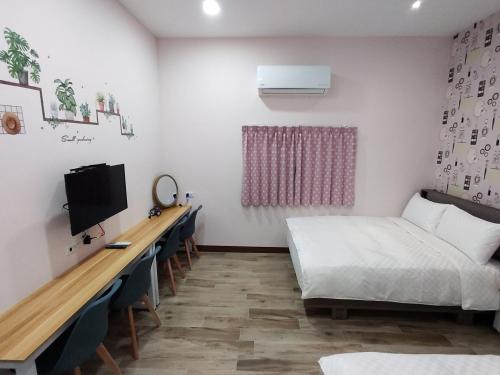 TV a/nebo společenská místnost v ubytování LaiKe B&B