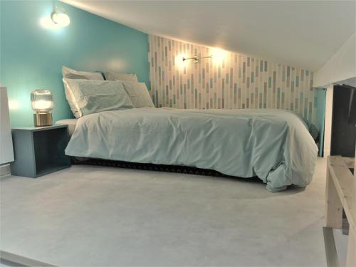 Postel nebo postele na pokoji v ubytování La Mezzanine par Picardie Homes