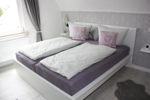 Ліжко або ліжка в номері Haus Lebenswert, Ferienhaus
