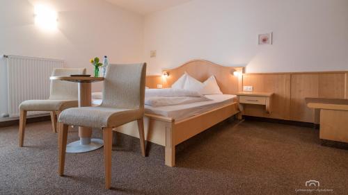 Postel nebo postele na pokoji v ubytování Kreuzstein Bed&Breakfast