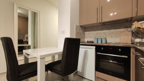 Una cocina o cocineta en Green Residence
