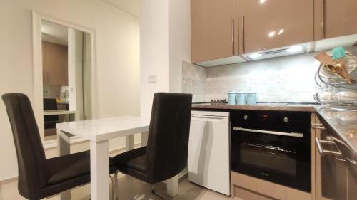 Una cocina o cocineta en Green Residence