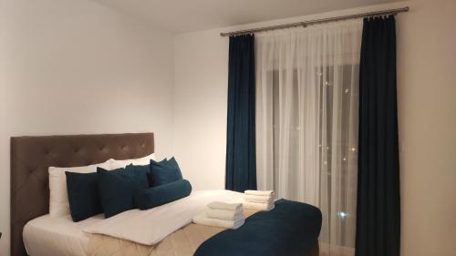 Una cama o camas en una habitación de Green Residence