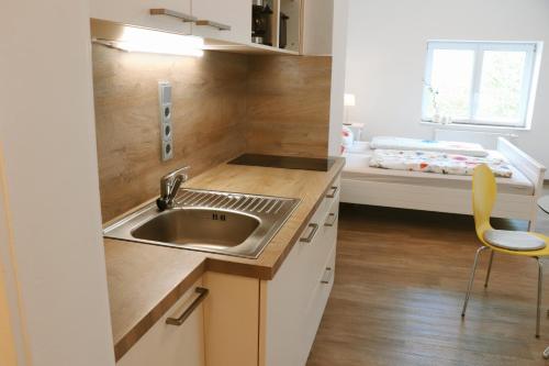 เตียงในห้องที่ Helles Apartment für 1-2 Pers. mit Parkplatz und WiFi