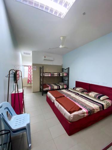 Ένα ή περισσότερα κρεβάτια σε δωμάτιο στο Buntong Homestay -Rooms Only