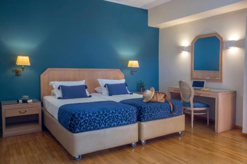 Cama o camas de una habitación en Delice Hotel - Family Apartments