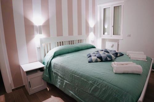 La Titina Home 객실 침대
