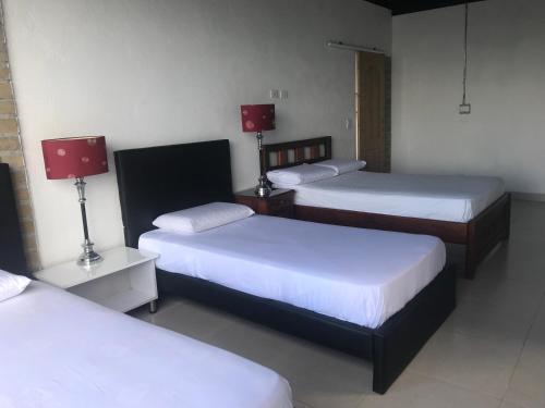 Una cama o camas en una habitación de El Espume de San Juan by JR
