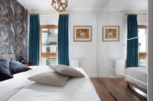 Posteľ alebo postele v izbe v ubytovaní NAP Apartments Nadmotławie Marina