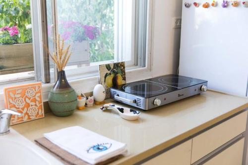 Una cocina o zona de cocina en נוריתא