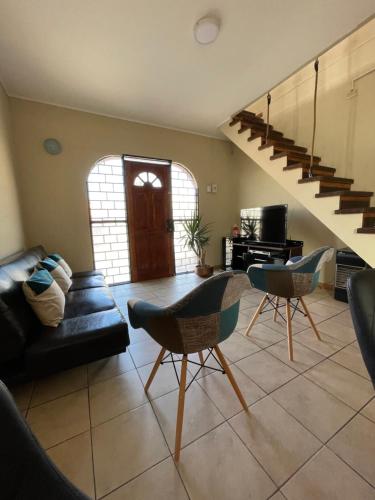 a living room with a couch and a table at Hotel Cecil in Vallenar