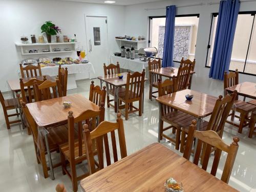 Apart-Hotel "Encantos do Mar" - Beira Marにあるレストランまたは飲食店