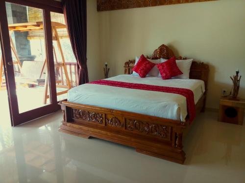 Letto o letti in una camera di Sukun Babonsay Villas