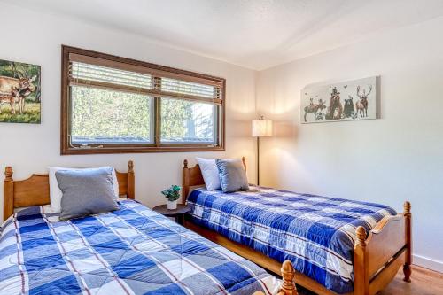 Postel nebo postele na pokoji v ubytování Wildwood Wonder