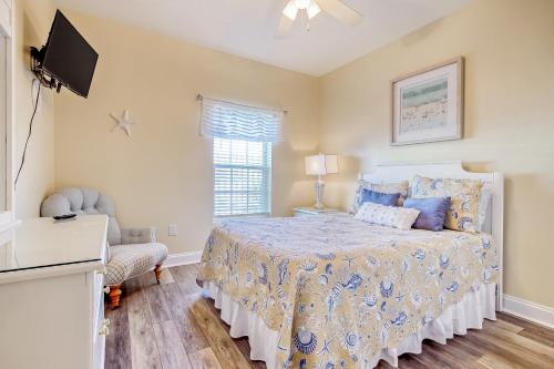 Ένα ή περισσότερα κρεβάτια σε δωμάτιο στο Coconut Grove 203