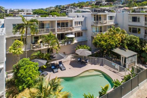 an aerial view of a building with a swimming pool at Surf Dance Apartments in Coolum Beach