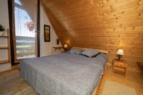 Кровать или кровати в номере Holiday Home Kuća Ulaga