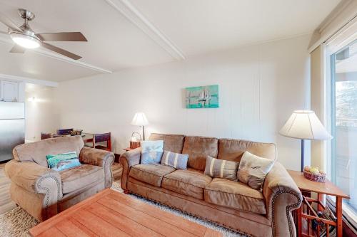 a living room with a couch and two chairs at Lakeside Mountain Retreat in Dillon