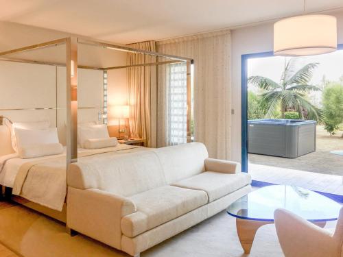 Postel nebo postele na pokoji v ubytování Akoya Hotel & Spa
