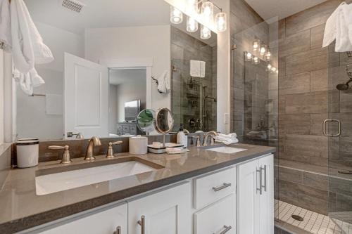 a bathroom with a large sink and a shower at Quarry Springs Retreat in Park City