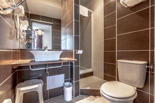 Koupelna v ubytování Hotel Le 21