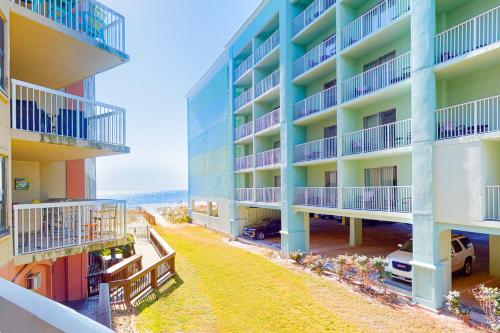 an aerial view of a building with balconies at Harbour Place 108 in Gulf Shores