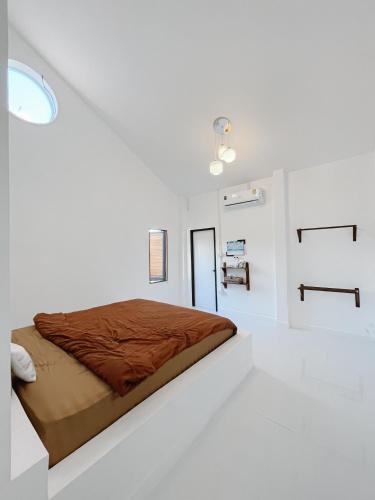 Ένα ή περισσότερα κρεβάτια σε δωμάτιο στο Aether Pai Villa