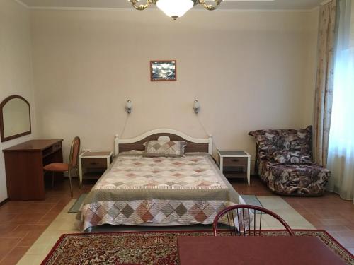 Кровать или кровати в номере Гостевой Дом Радужная