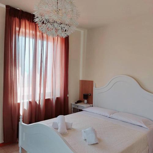 Ένα ή περισσότερα κρεβάτια σε δωμάτιο στο Hotel Valbella
