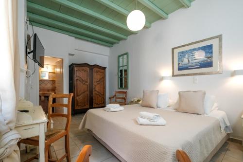 Letto o letti in una camera di Golden Beach Studios & Suites