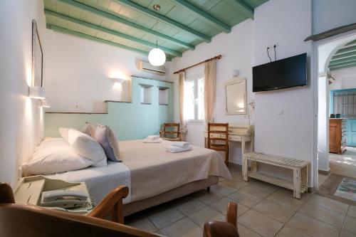 Letto o letti in una camera di Golden Beach Studios & Suites