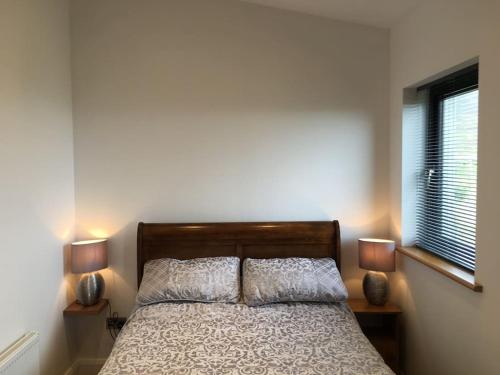 Postel nebo postele na pokoji v ubytování Silver Strand Chalets
