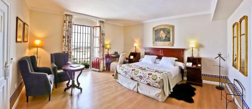 Katil atau katil-katil dalam bilik di Hotel Alcázar de la Reina