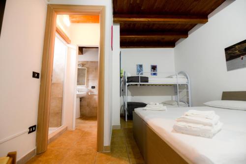 Voodi või voodid majutusasutuse B&B Macchia Mediterranea toas