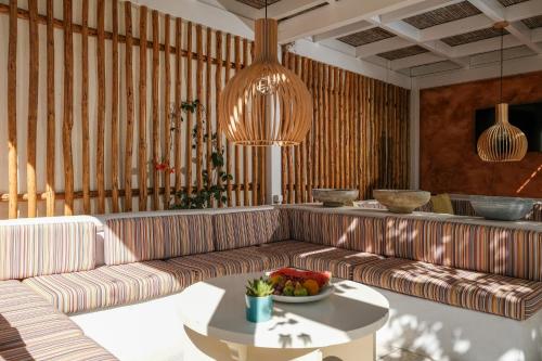 Area soggiorno di Golden Beach Studios & Suites