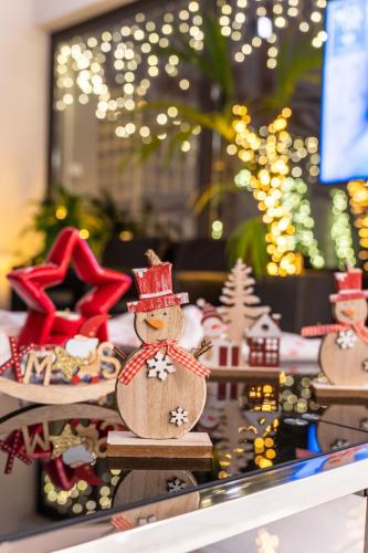 a display of christmas items on a table at Athens Panorama Project in Athens