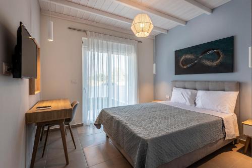 Cama ou camas em um quarto em Tamaris Villa